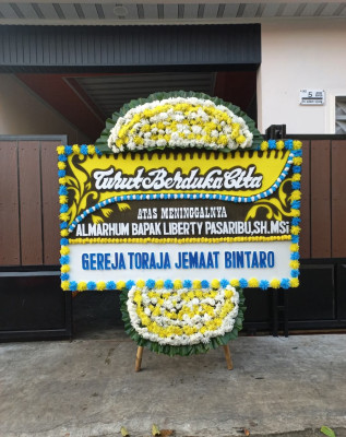 Papan Bunga Duka di Leneng